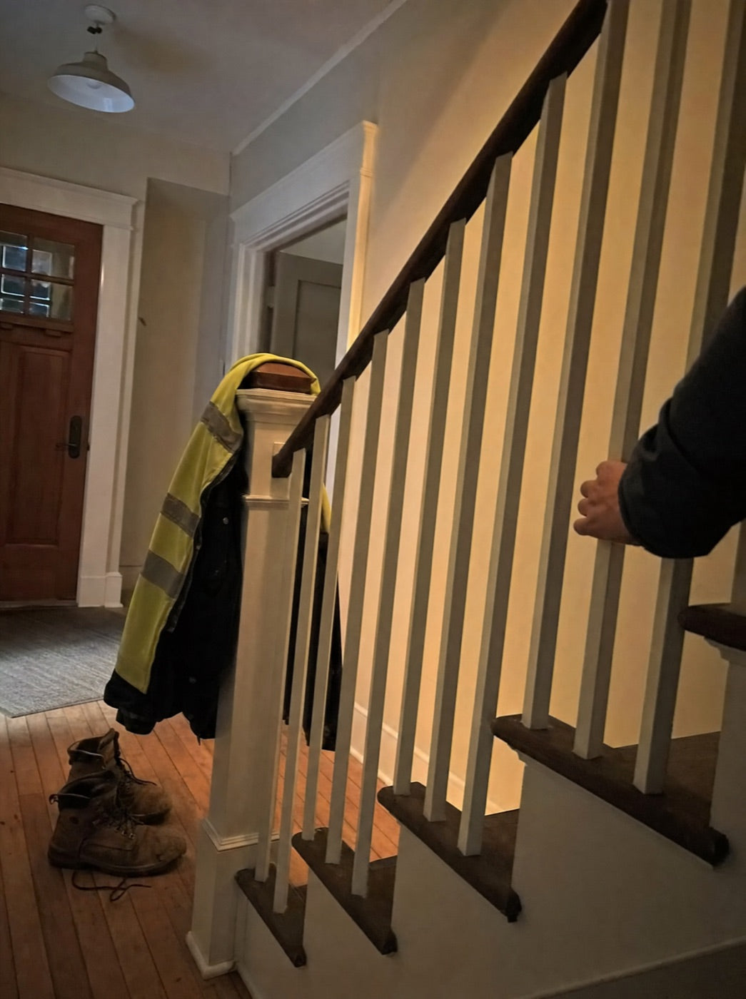 Work boots at the bottom of the stairs